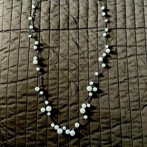 Pearls in a long necklace